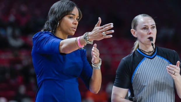 Texas A&M coach Joni Taylor on the court against the Arkansas Razorbacks on Sunday.
